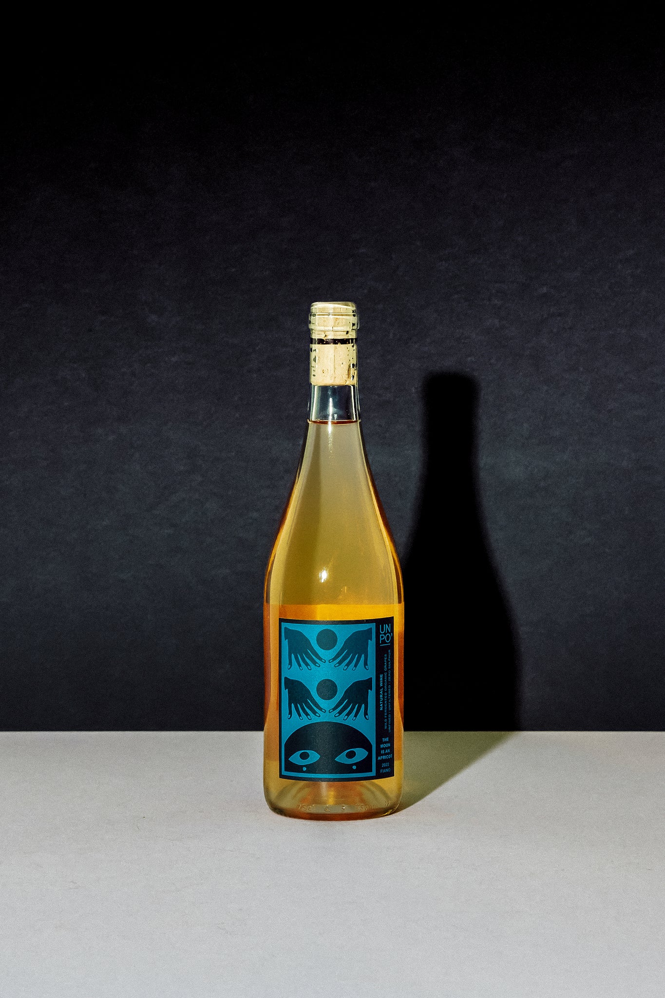 UN PO' → 2022 The Moon Is An Apricot Fiano.